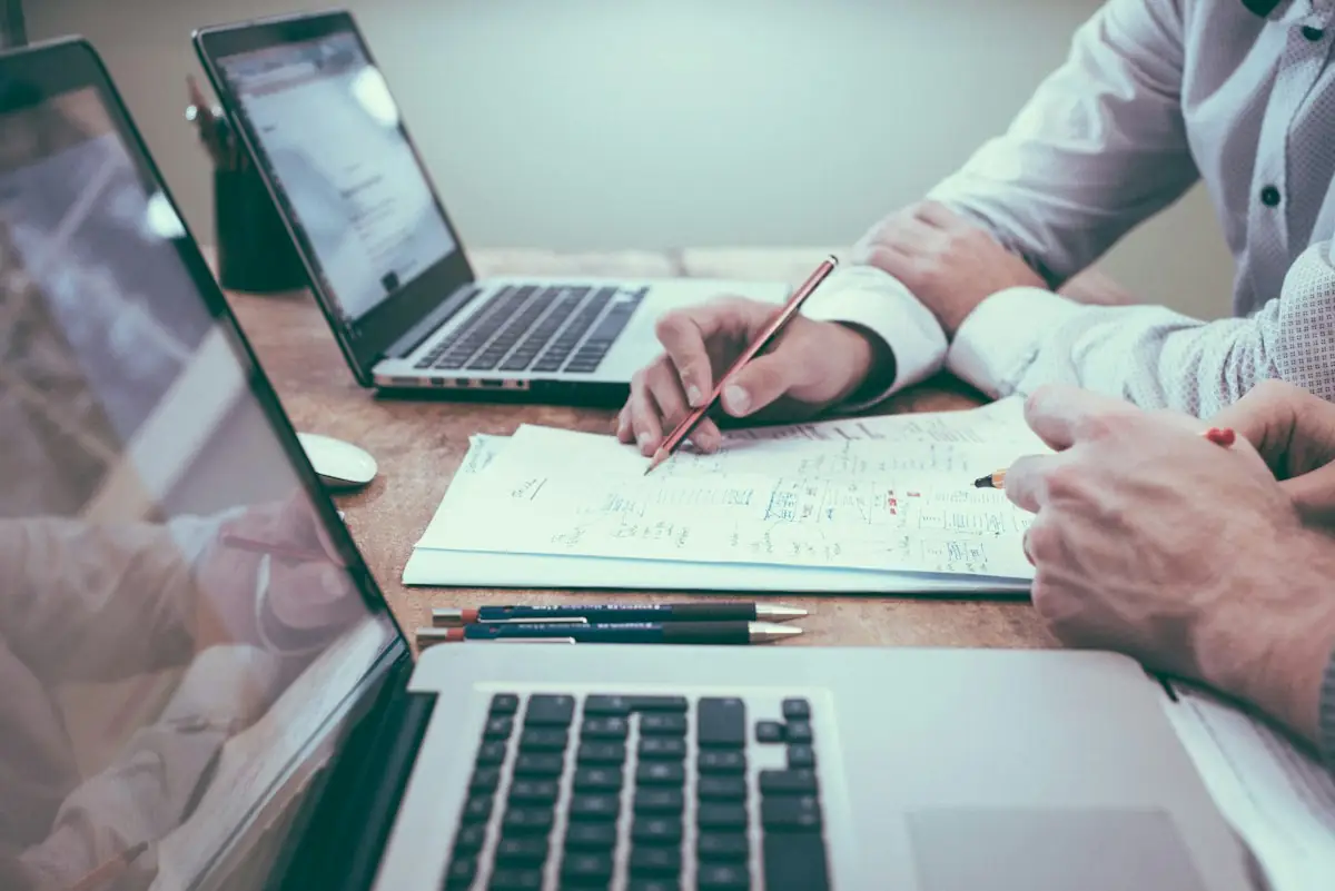 Elderly couple reviewing financial documents